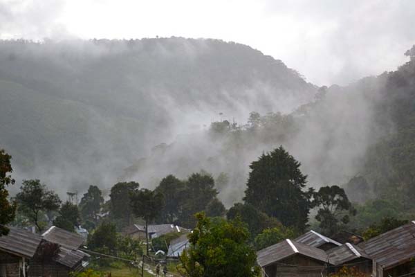 Tall, forested mountains surround the village of Demaisi in West Papua. Photo by Duma T Sanda.