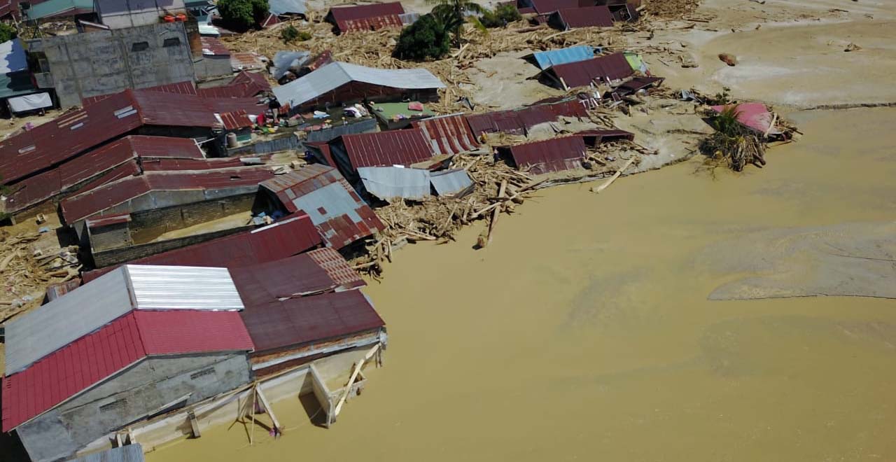 Pemukiman penduduk yang terendam banjir di Luwu Utara. Foto: BNPB